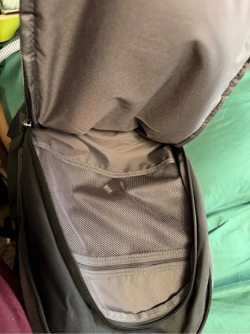 Nike Black Backpack with White Graphic and Elastic Bungee Cord
